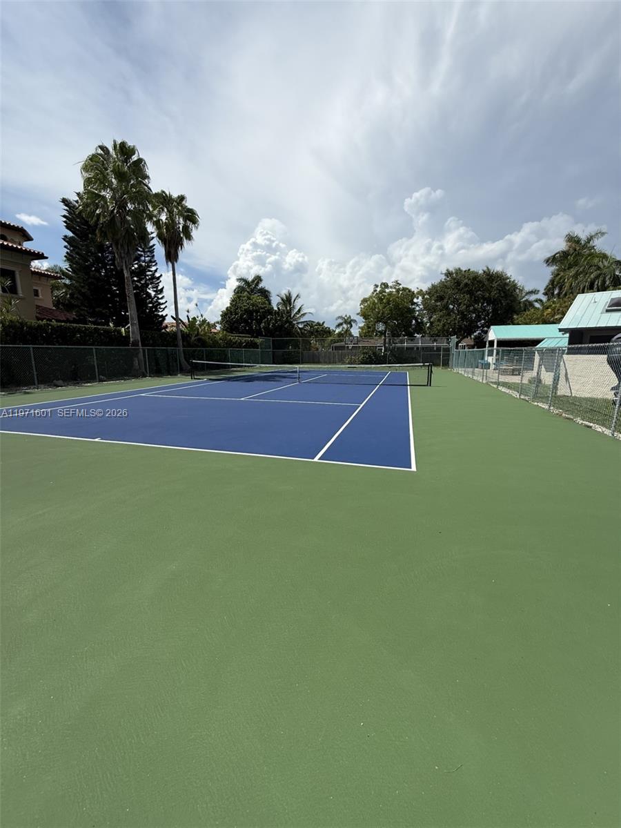 17640 Old Cutler Road Palmetto Bay, FL 33157 - Photo 50 of 56 a tennis court with view of lake