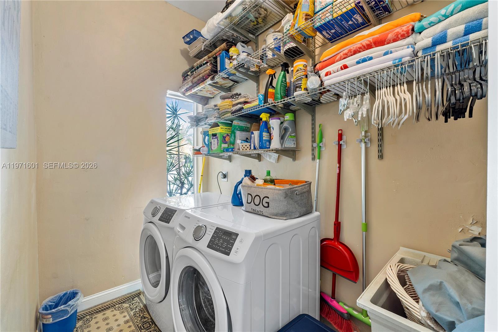 17640 Old Cutler Road Palmetto Bay, FL 33157 - Photo 56 of 56 a utility room with dryer and washer