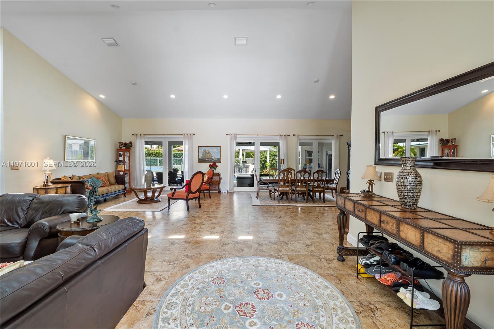 17640 Old Cutler Road Palmetto Bay, FL 33157 - Photo 6 of 56 a living room with furniture and wooden floor