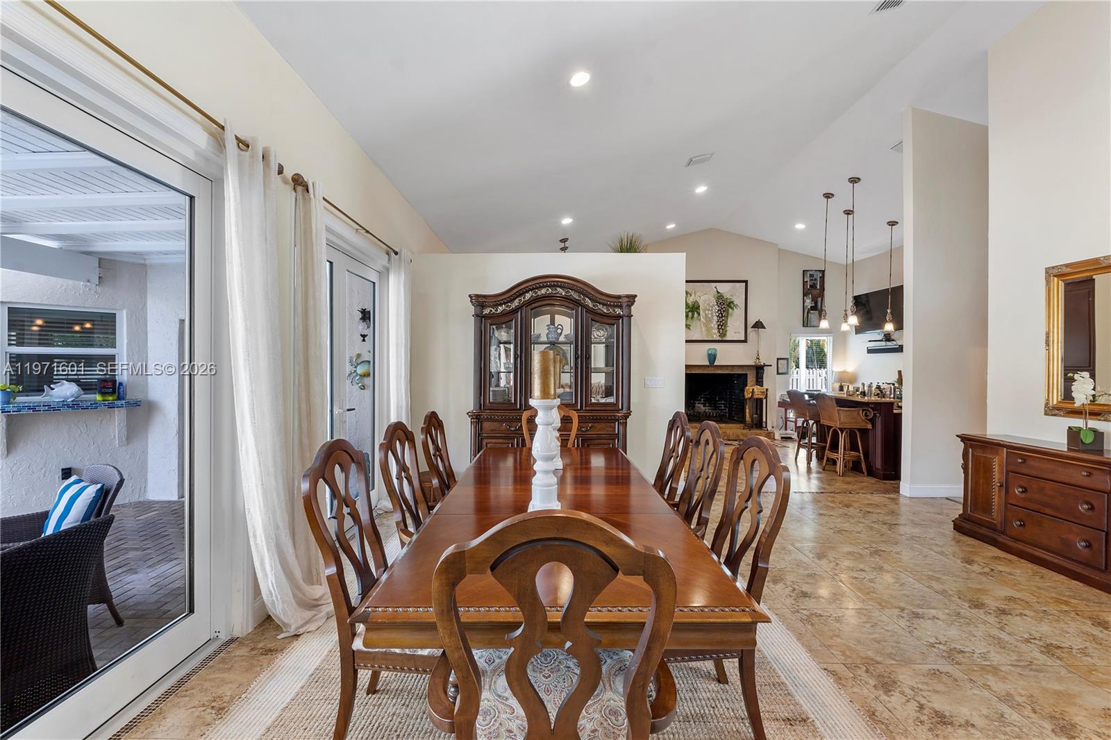 17640 Old Cutler Road Palmetto Bay, FL 33157 - Photo 10 of 56 a view of a dining room with furniture and wooden floor