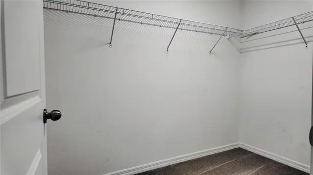 a view of a room with racks on the wall