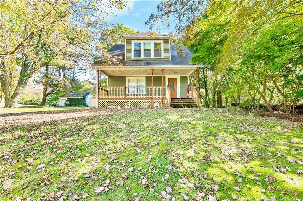 311 Unity Road Trumbull, CT 06611 - Photo 1 of 1 front view of a house with a yard