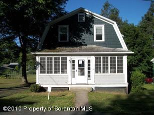100 James Street Shavertown, PA 18708 - Photo 1 of 14 a view of a house with backyard and sitting area