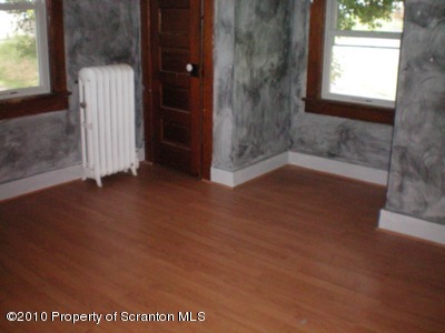 100 James Street Shavertown, PA 18708 - Photo 7 of 14 a view of an empty room with a window