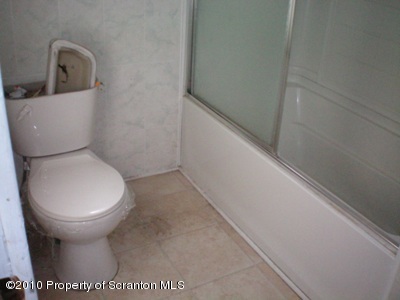 100 James Street Shavertown, PA 18708 - Photo 9 of 14 a bathroom with a toilet and a sink
