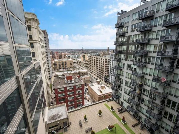 a view of a city with tall buildings
