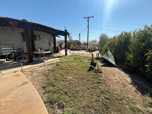 a kitchen with a sink appliances and cabinets