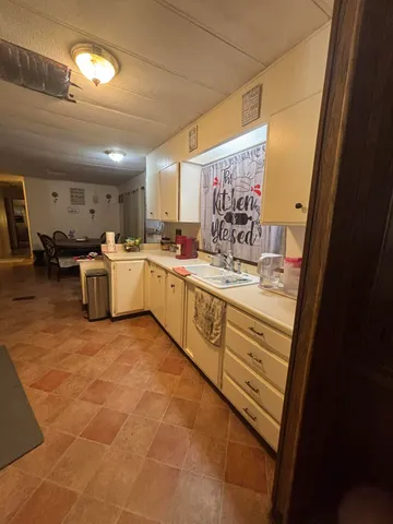 a room with furniture and a chandelier