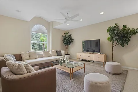 a view of a house with backyard and porch