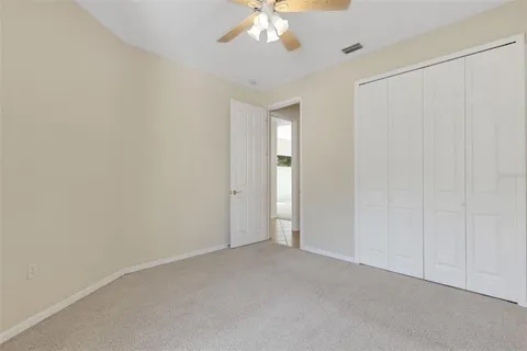 an aerial view of a house with yard swimming pool and outdoor seating