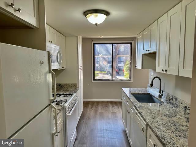5247 West Running Brook Road, Unit 101 Columbia, MD 21044 - Photo 4 of 39 Updated Galley Kitchen
