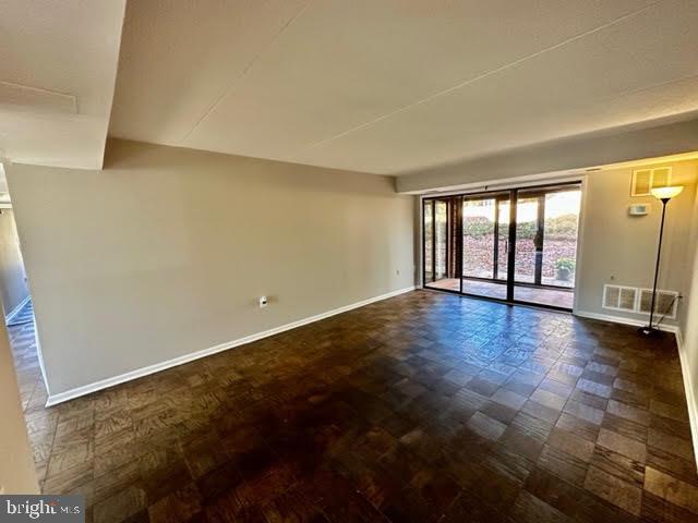 5247 West Running Brook Road, Unit 101 Columbia, MD 21044 - Photo 5 of 39 Large Living Rm Leads to Enclosed Porch Area