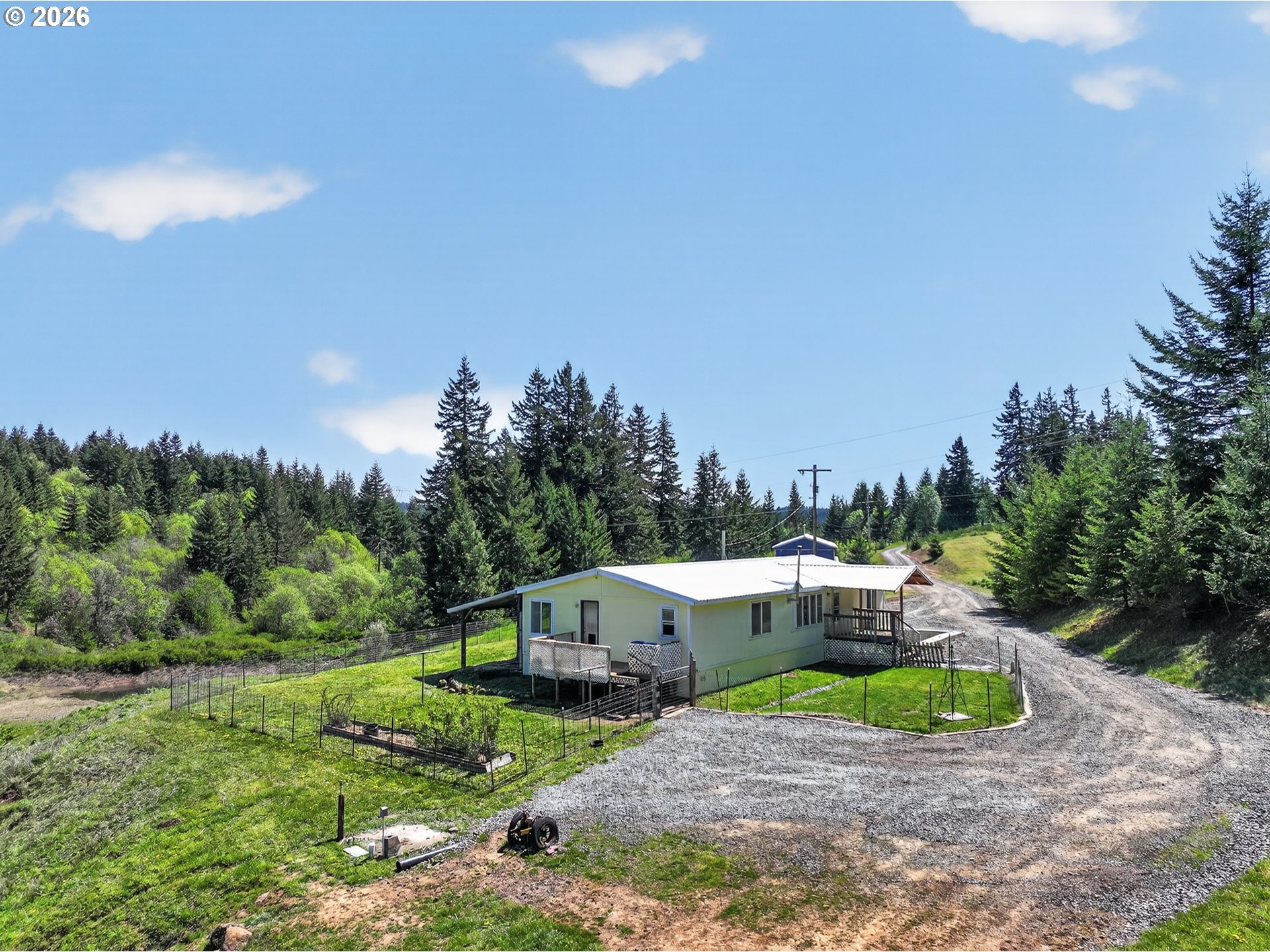 97 Kida Road White Salmon, WA 98672 - Photo 19 of 45 an aerial view of a house with a yard