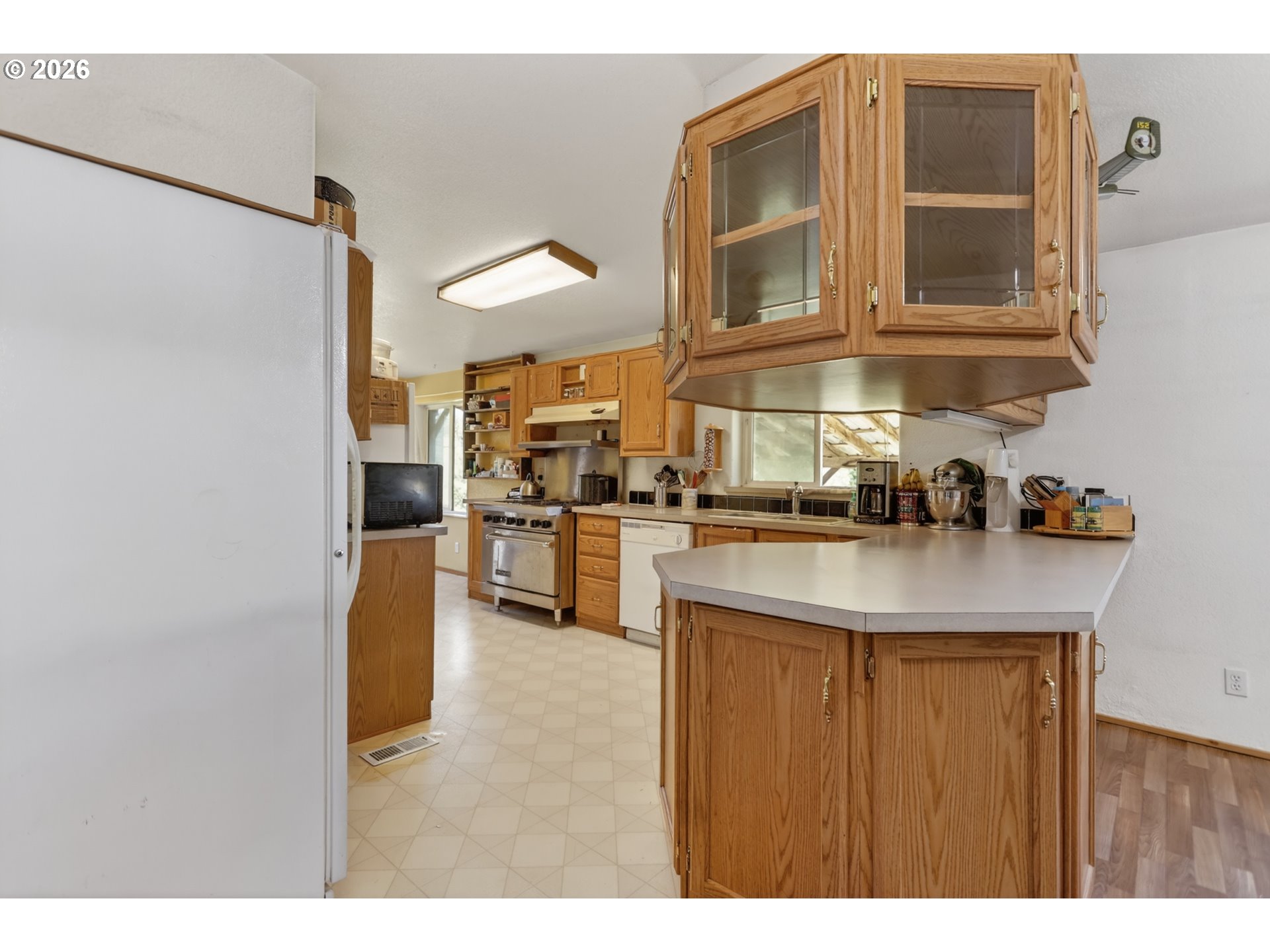 97 Kida Road White Salmon, WA 98672 - Photo 30 of 45 a kitchen with a refrigerator and a sink