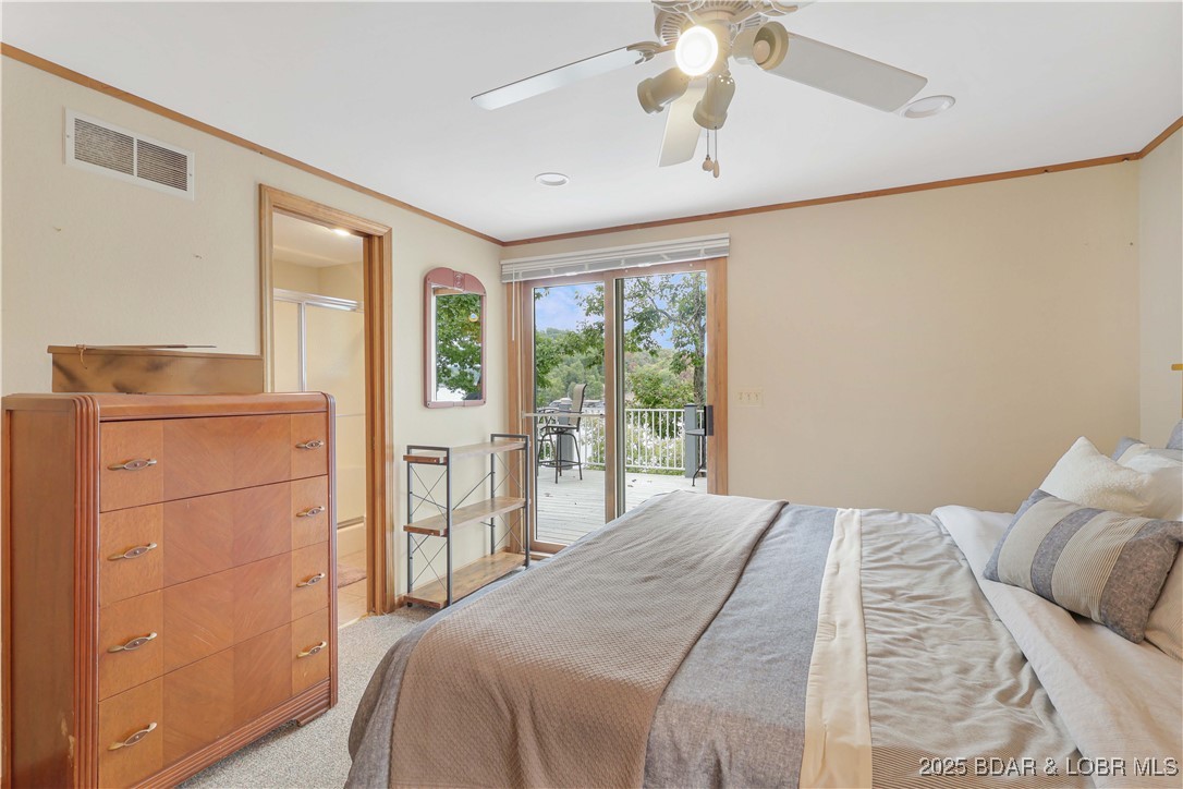 30895 Berry Road Stover, MO 65078 - Photo 15 of 47 Main level bedroom opens to lakeside deck