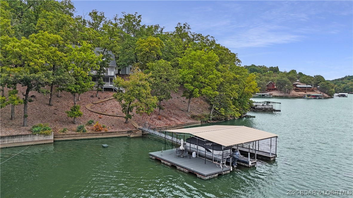 30895 Berry Road Stover, MO 65078 - Photo 2 of 47 Two well dock, swim platform with new trex decking