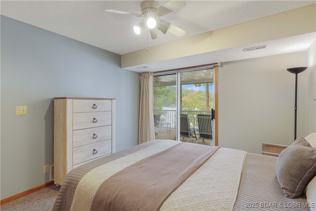 30895 Berry Road Stover, MO 65078 - Photo 27 of 47 Access to screened porch