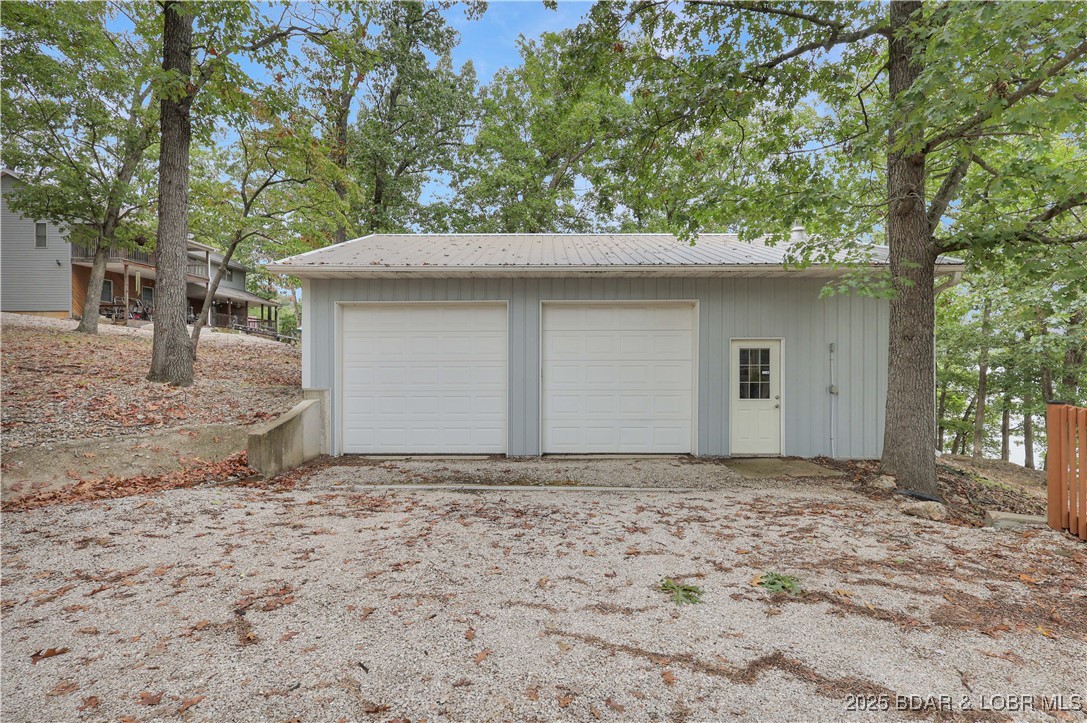 30895 Berry Road Stover, MO 65078 - Photo 40 of 47 over sized two car garage 9' doors
