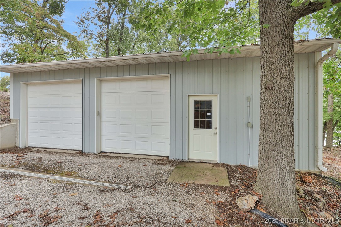 30895 Berry Road Stover, MO 65078 - Photo 41 of 47 Garage door openers plus a man door