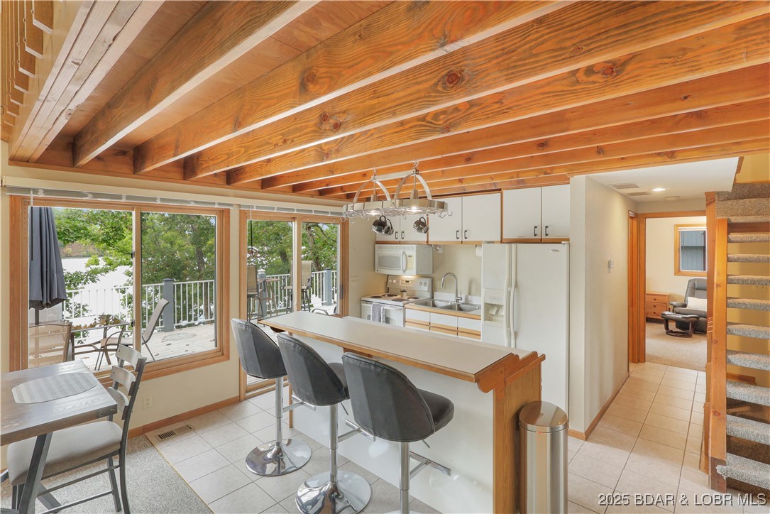 30895 Berry Road Stover, MO 65078 - Photo 10 of 47 Kitchen with bar seating