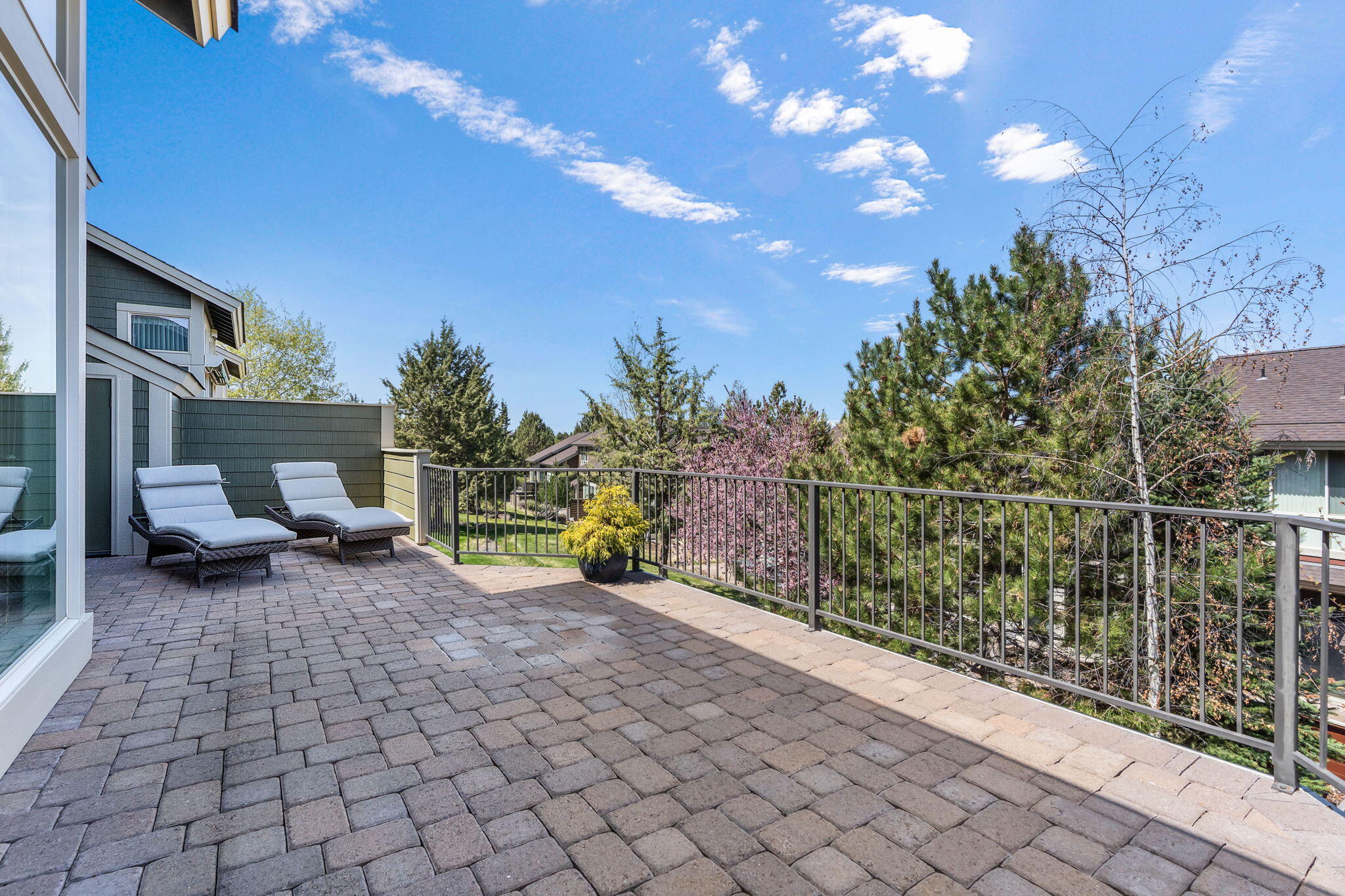 10870 Village Loop Redmond, OR 97756 - Photo 30 of 35 a view of a chair and tables in the patio
