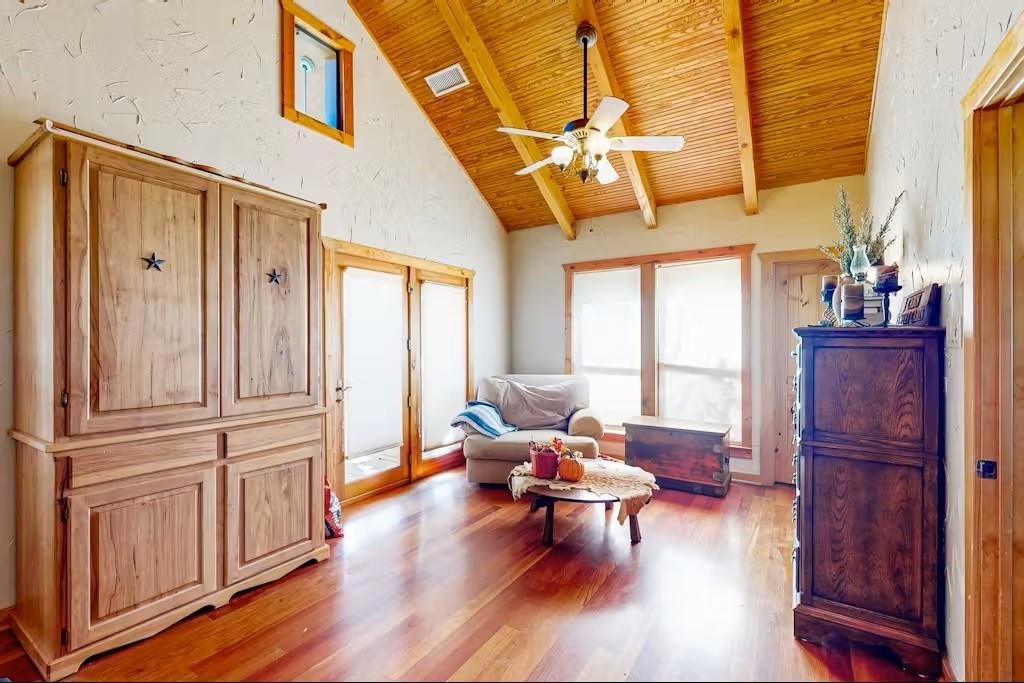 120 Live Oak Road Whitney, TX 76692 - Photo 11 of 21 a living room with furniture and wooden floor