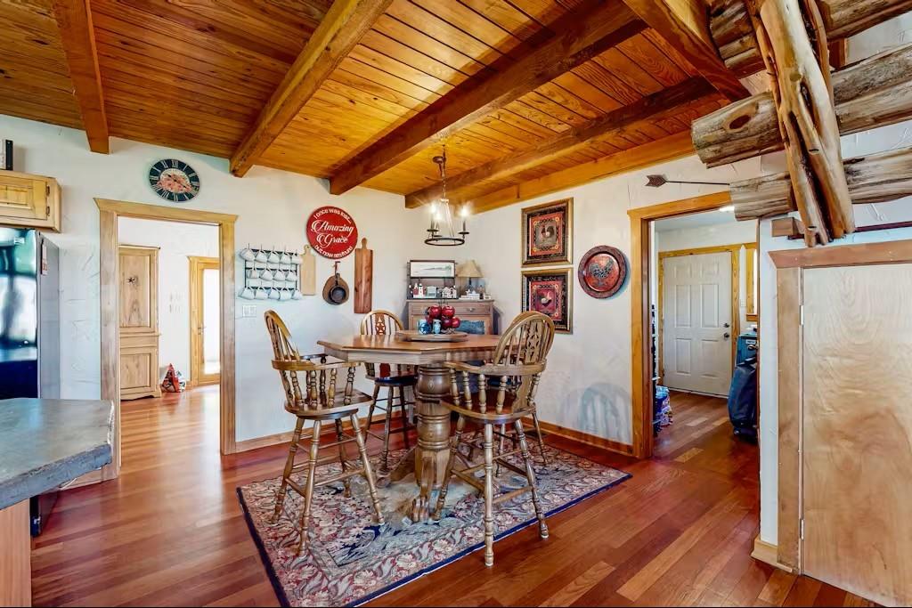 120 Live Oak Road Whitney, TX 76692 - Photo 8 of 21 a view of a dining room with furniture window and wooden floor