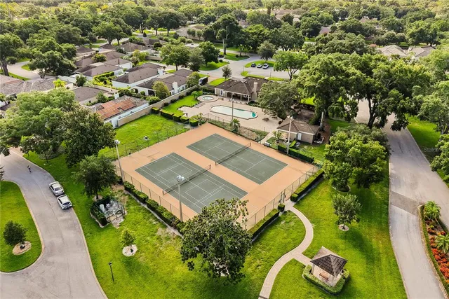 an aerial view of a house with a garden