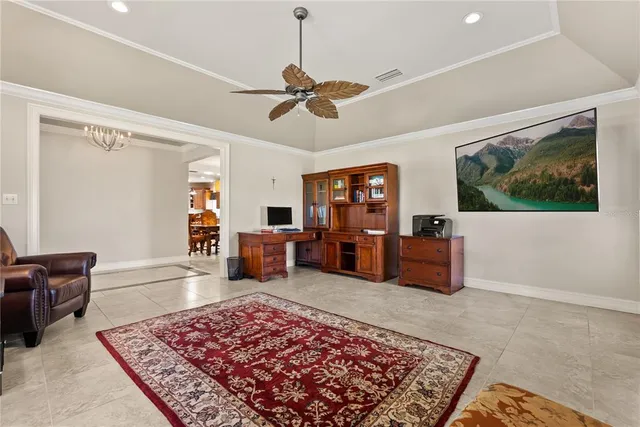 a living room with furniture rug and window