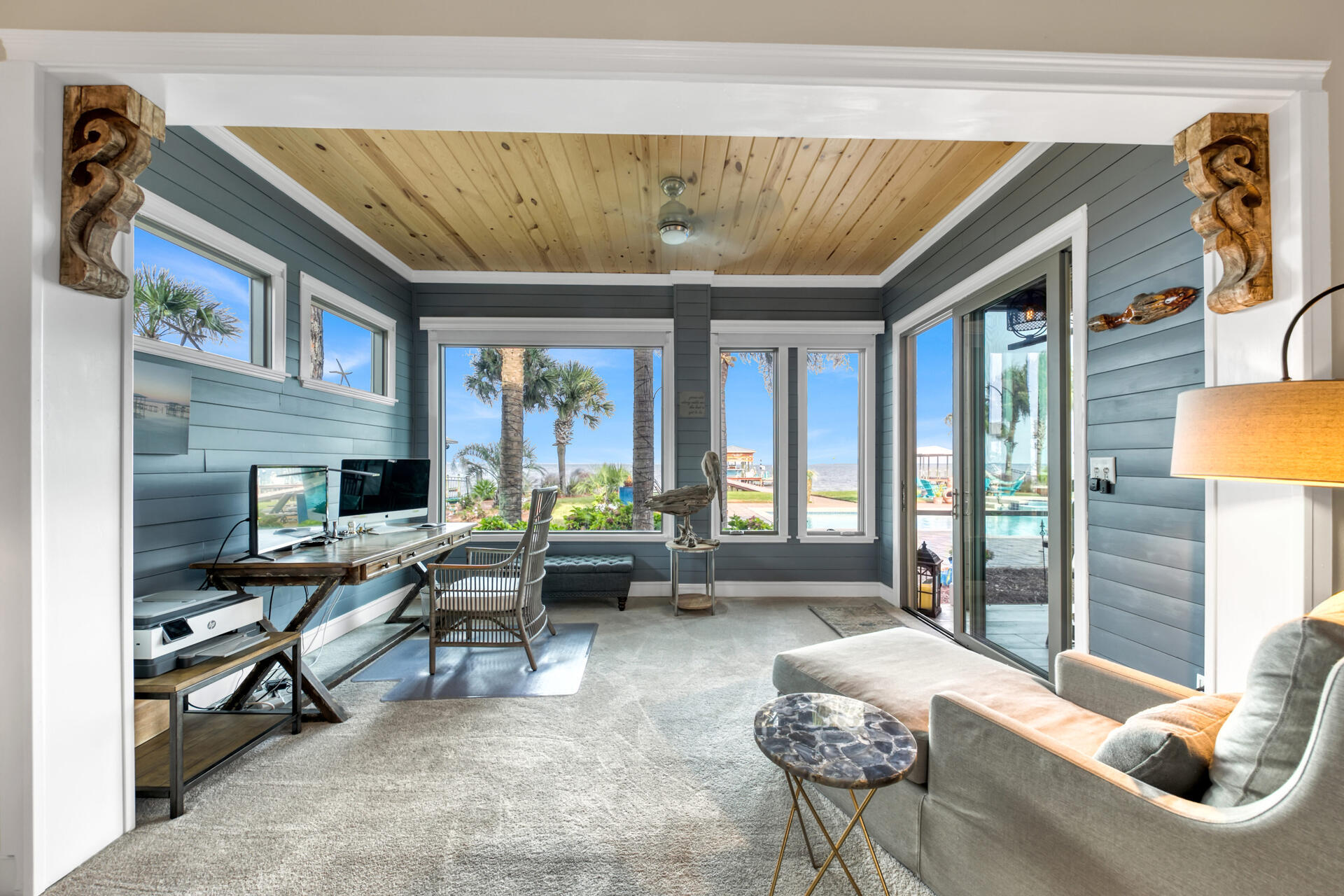 1537 Driftwood Point Road Santa Rosa Beach, FL 32459 - Photo 54 of 77 a living room with furniture and a floor to ceiling window