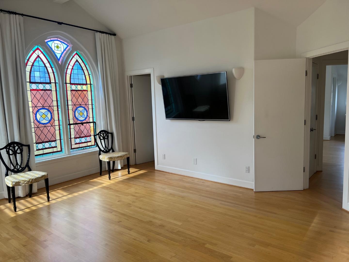 2198 Avy Avenue Menlo Park, CA 94025 - Photo 14 of 39 a living room with furniture and a flat screen tv