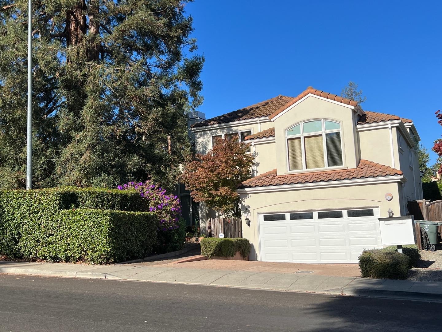 2198 Avy Avenue Menlo Park, CA 94025 - Photo 2 of 39 a front view of a house with a yard