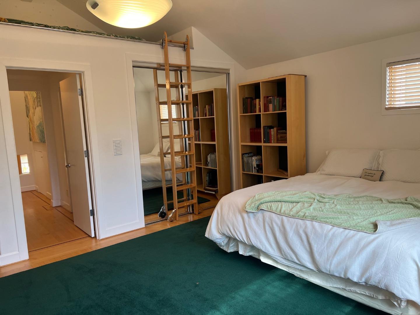 2198 Avy Avenue Menlo Park, CA 94025 - Photo 25 of 39 a bedroom with a bed and closet