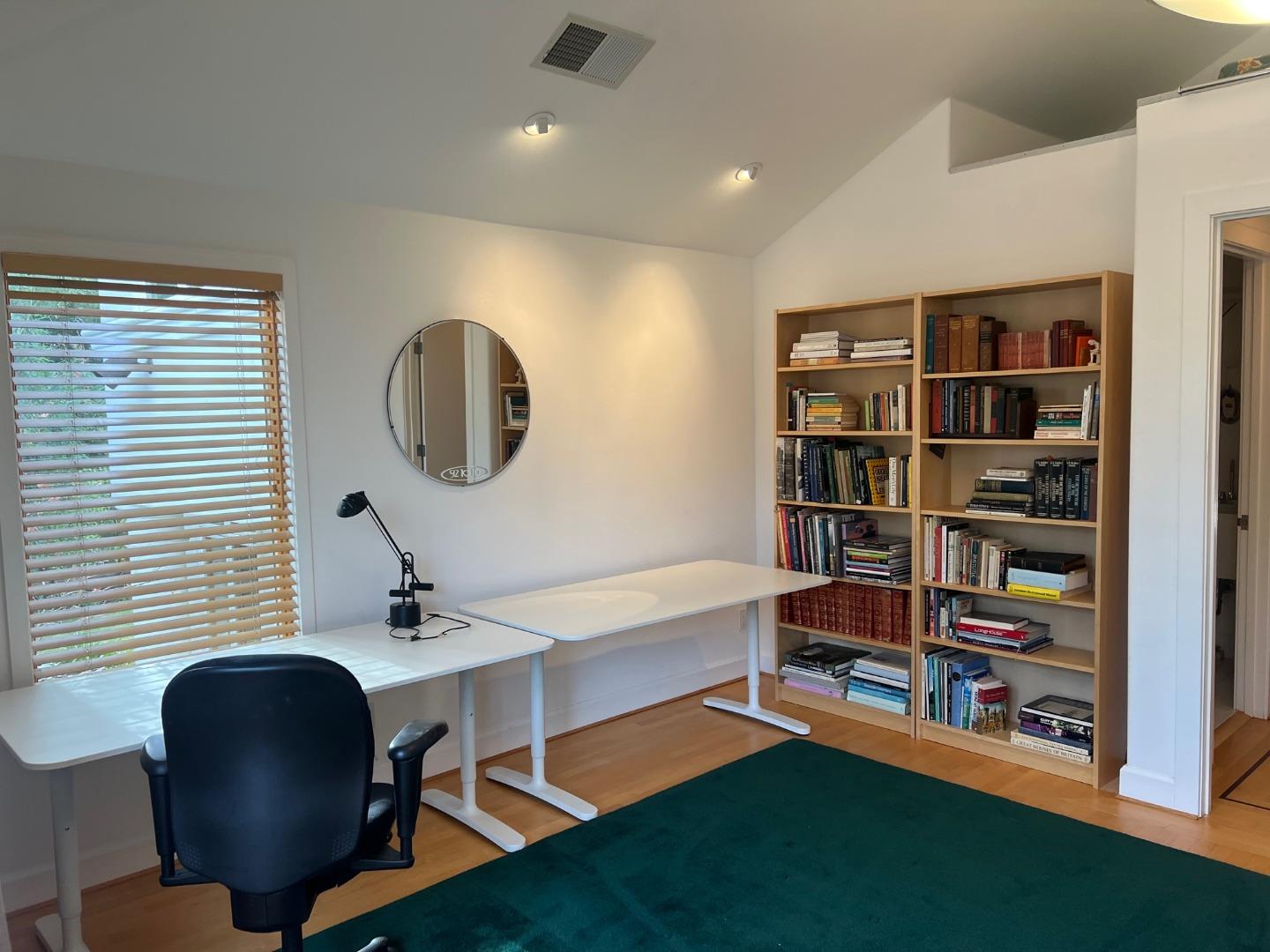 2198 Avy Avenue Menlo Park, CA 94025 - Photo 26 of 39 a view of a workspace with furniture and a window