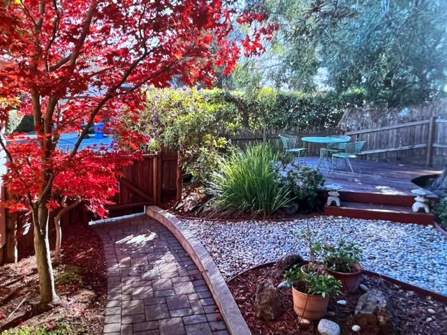 2198 Avy Avenue Menlo Park, CA 94025 - Photo 3 of 39 a backyard of a house with lots of green space