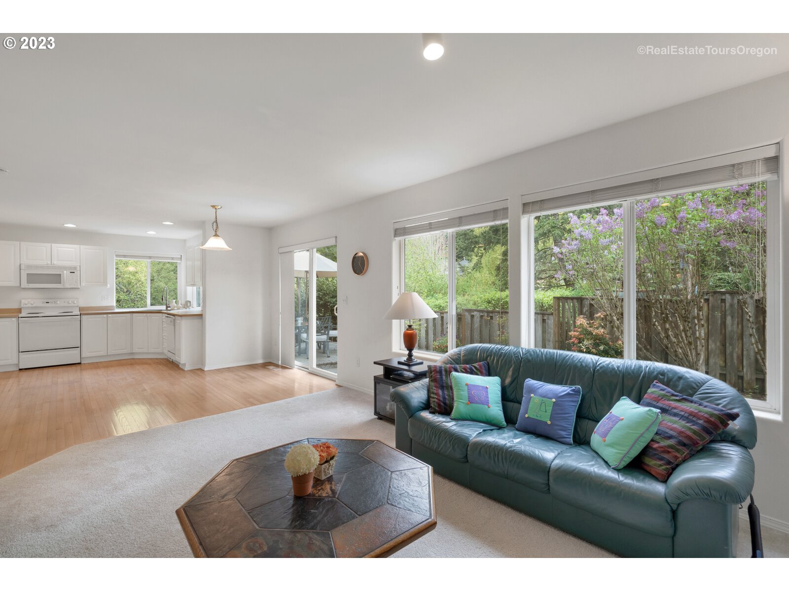 14345 Holly Springs Road Lake Oswego, OR 97035 - Photo 11 of 32 a living room with furniture and a large window