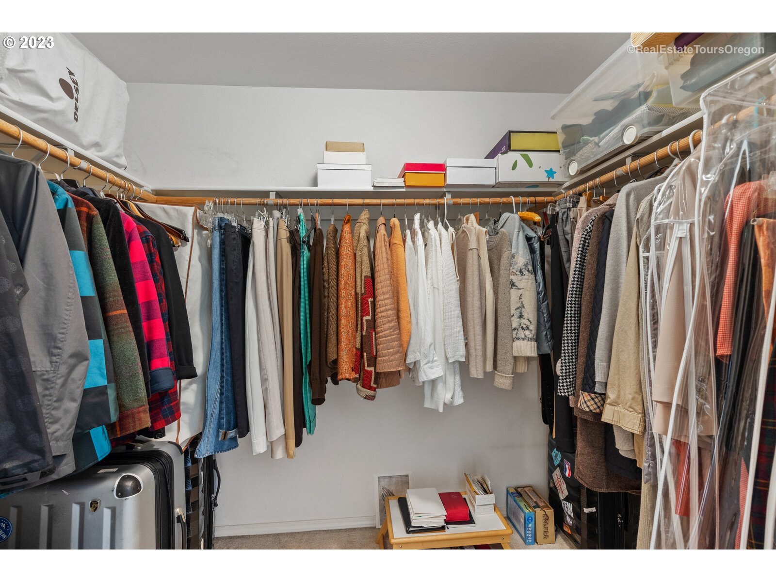 14345 Holly Springs Road Lake Oswego, OR 97035 - Photo 18 of 32 a view of walk in closet with clothes and shoes