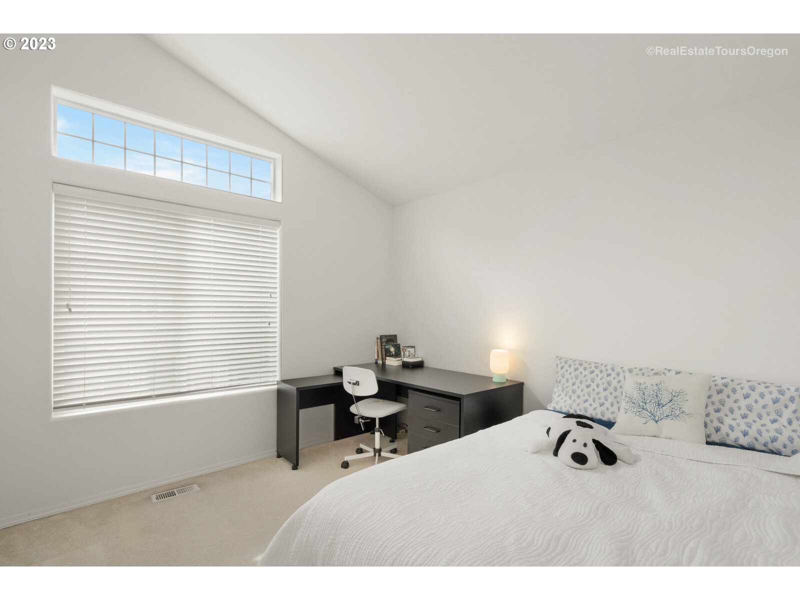 14345 Holly Springs Road Lake Oswego, OR 97035 - Photo 19 of 32 a room with a bed and a window