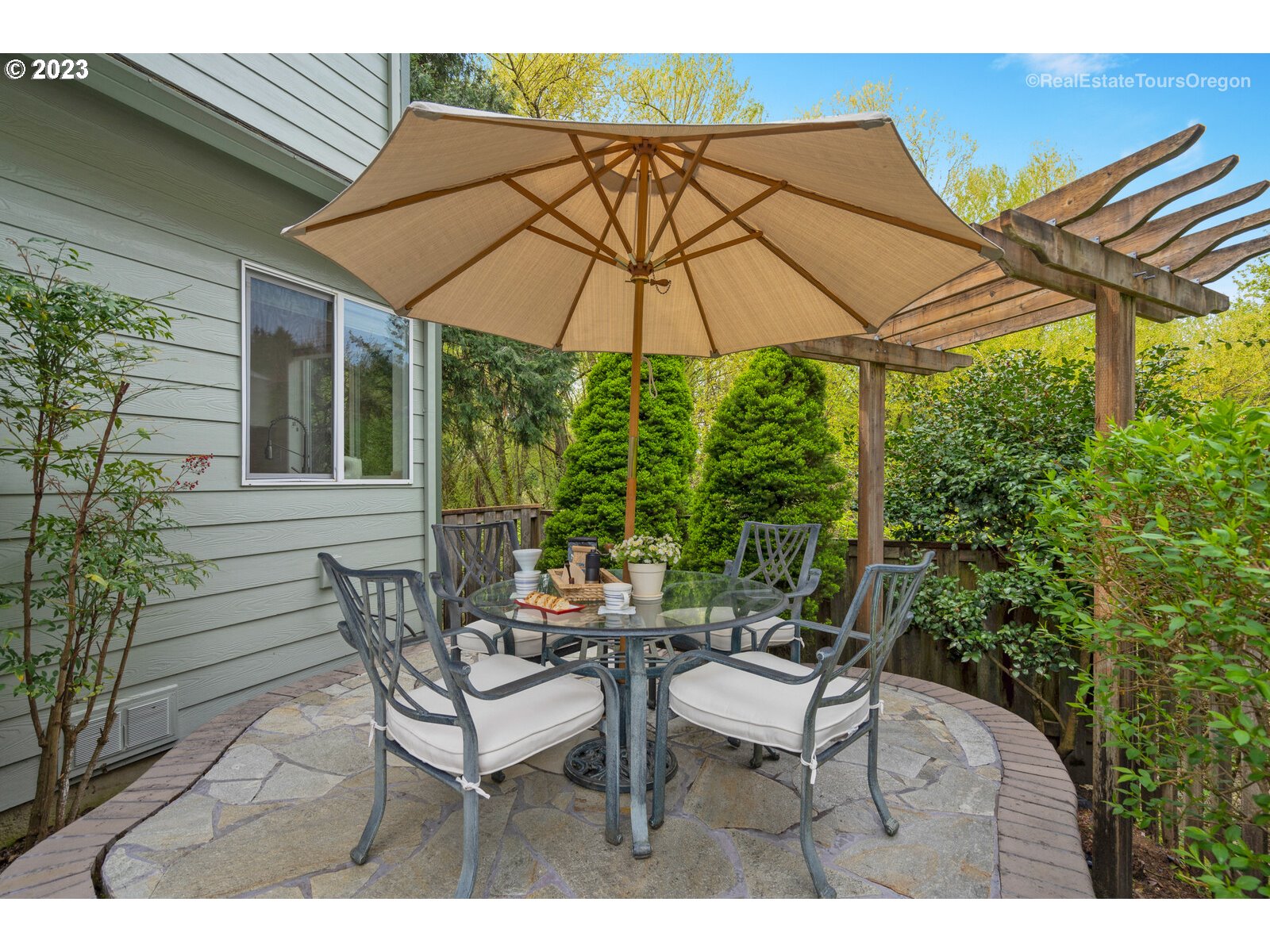 14345 Holly Springs Road Lake Oswego, OR 97035 - Photo 30 of 32 a view of an outdoor sitting area with furniture and backyard