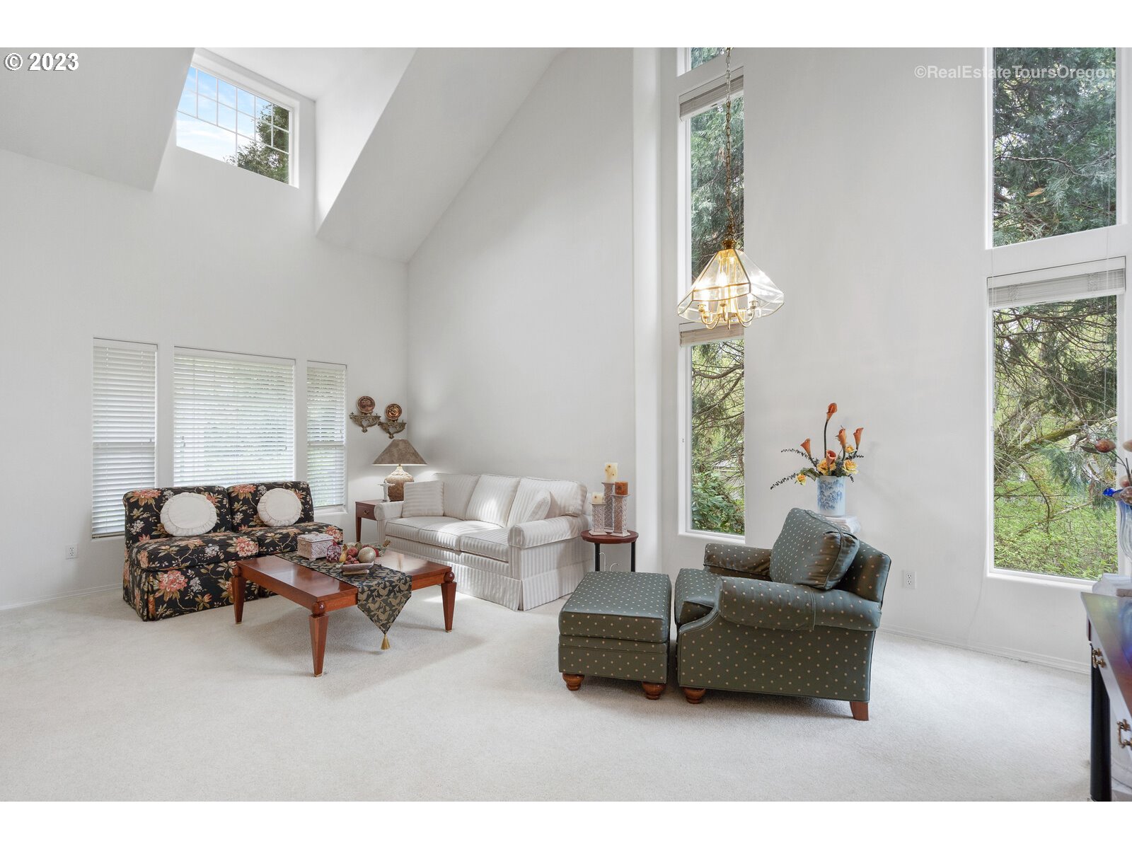 14345 Holly Springs Road Lake Oswego, OR 97035 - Photo 3 of 32 a living room with furniture and a window