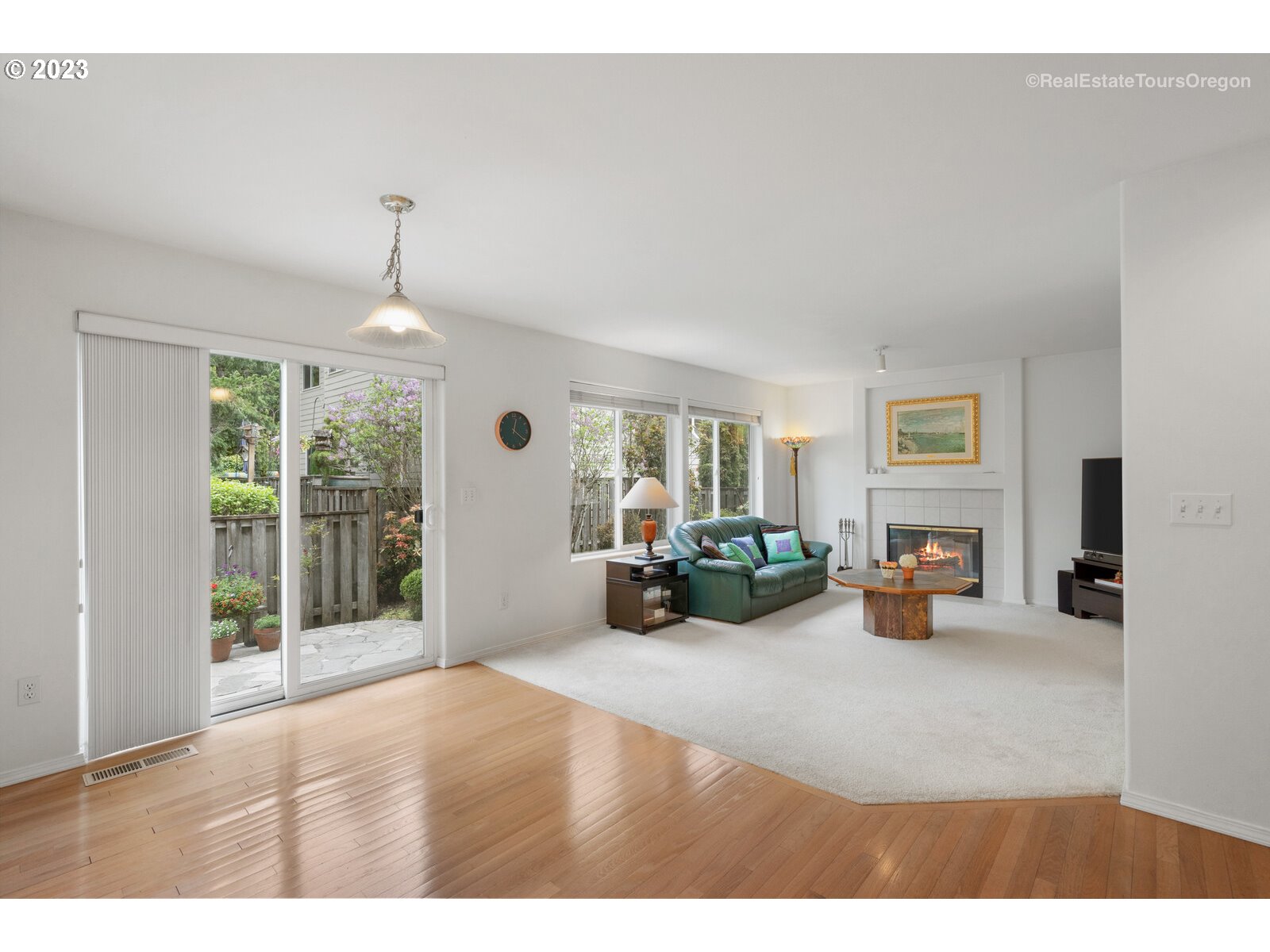 14345 Holly Springs Road Lake Oswego, OR 97035 - Photo 8 of 32 a view of living room filled with furniture and chandelier