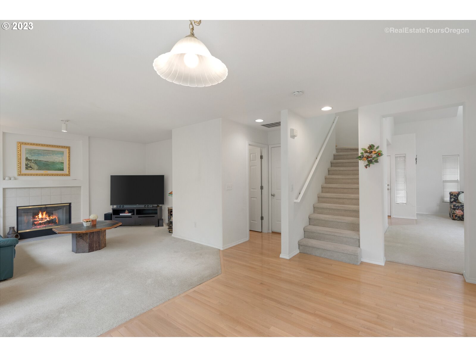 14345 Holly Springs Road Lake Oswego, OR 97035 - Photo 9 of 32 a living room with furniture and a flat screen tv