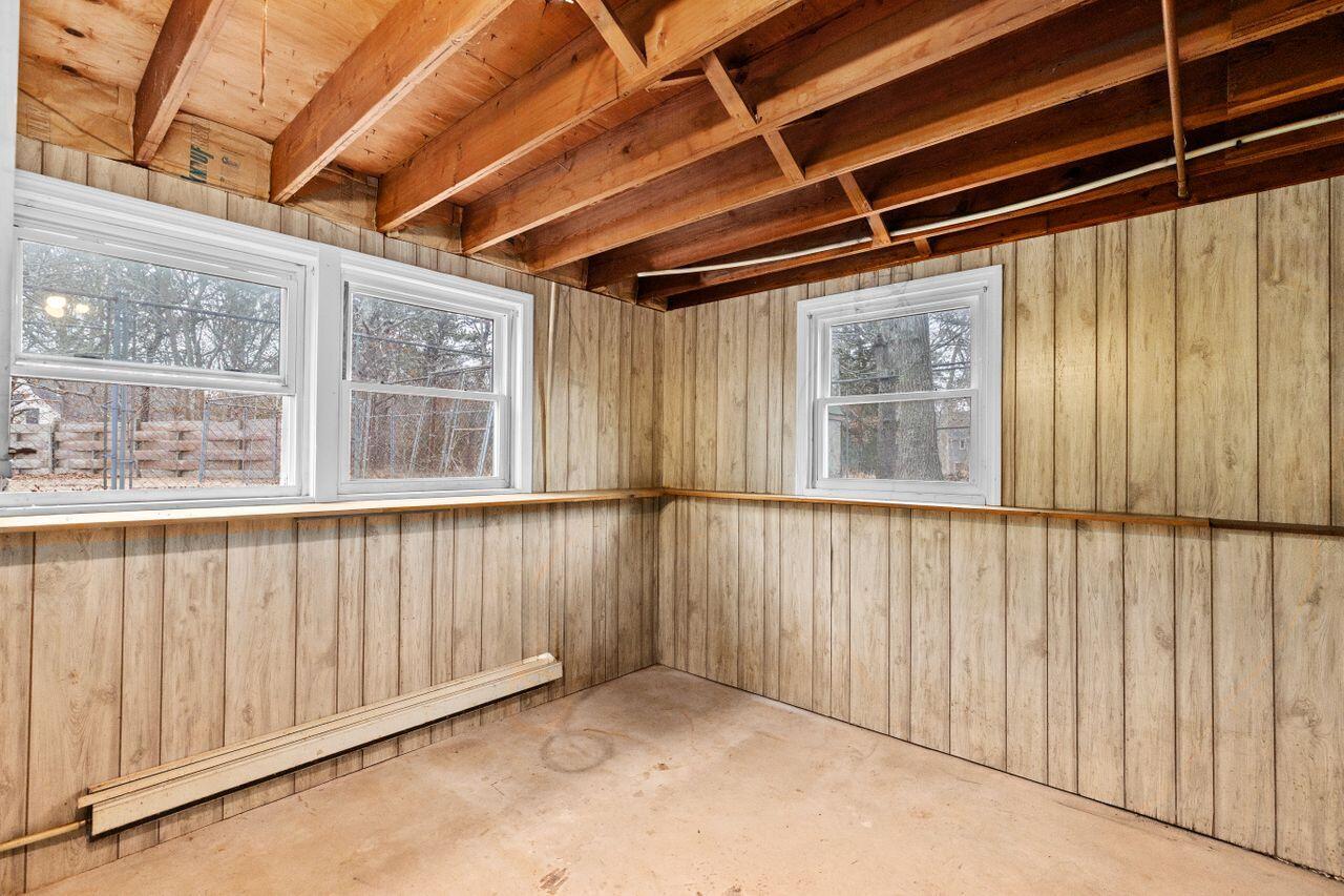 1460 Massasoit Road Eastham, MA 02642 - Photo 30 of 42 a view of an empty room with a window