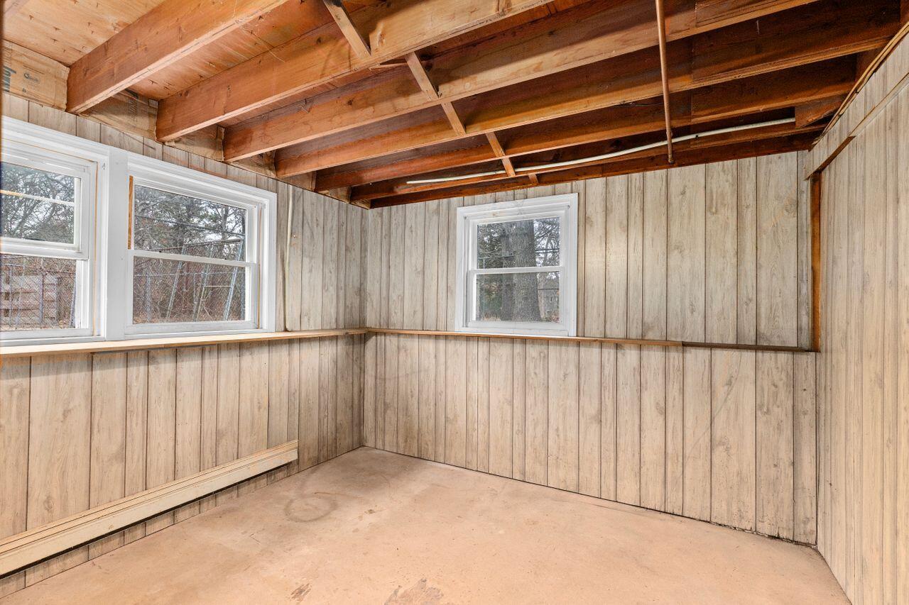 1460 Massasoit Road Eastham, MA 02642 - Photo 31 of 42 a view of an empty room with a window