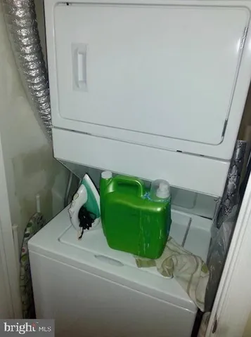 a bathroom with a green and white sink