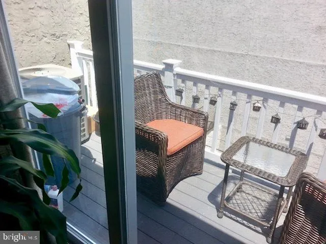 a view of staircase with white walls