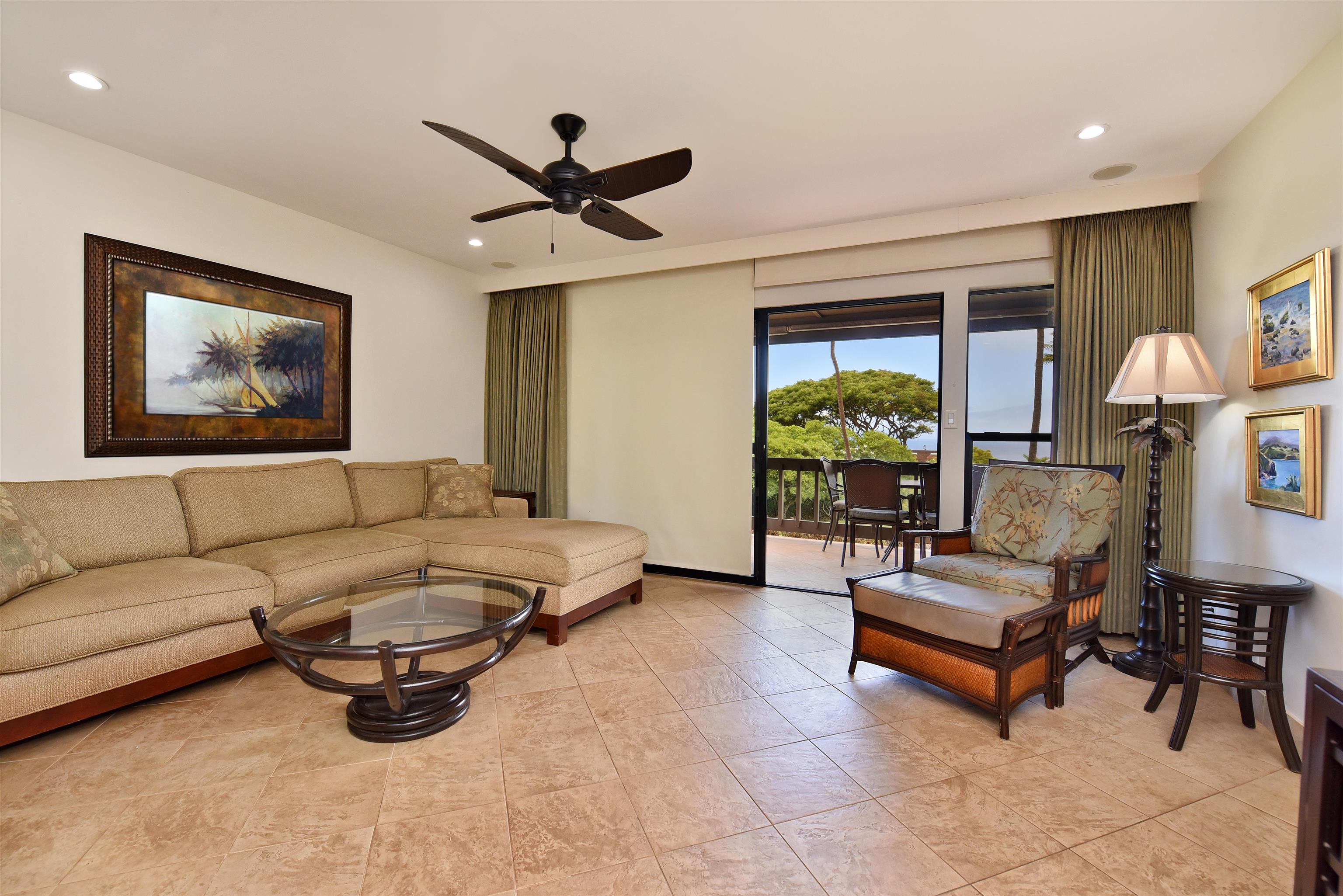 150 Puukolii Road, Unit 52 Lahaina, HI 96761 - Photo 15 of 50 a living room with furniture and a window