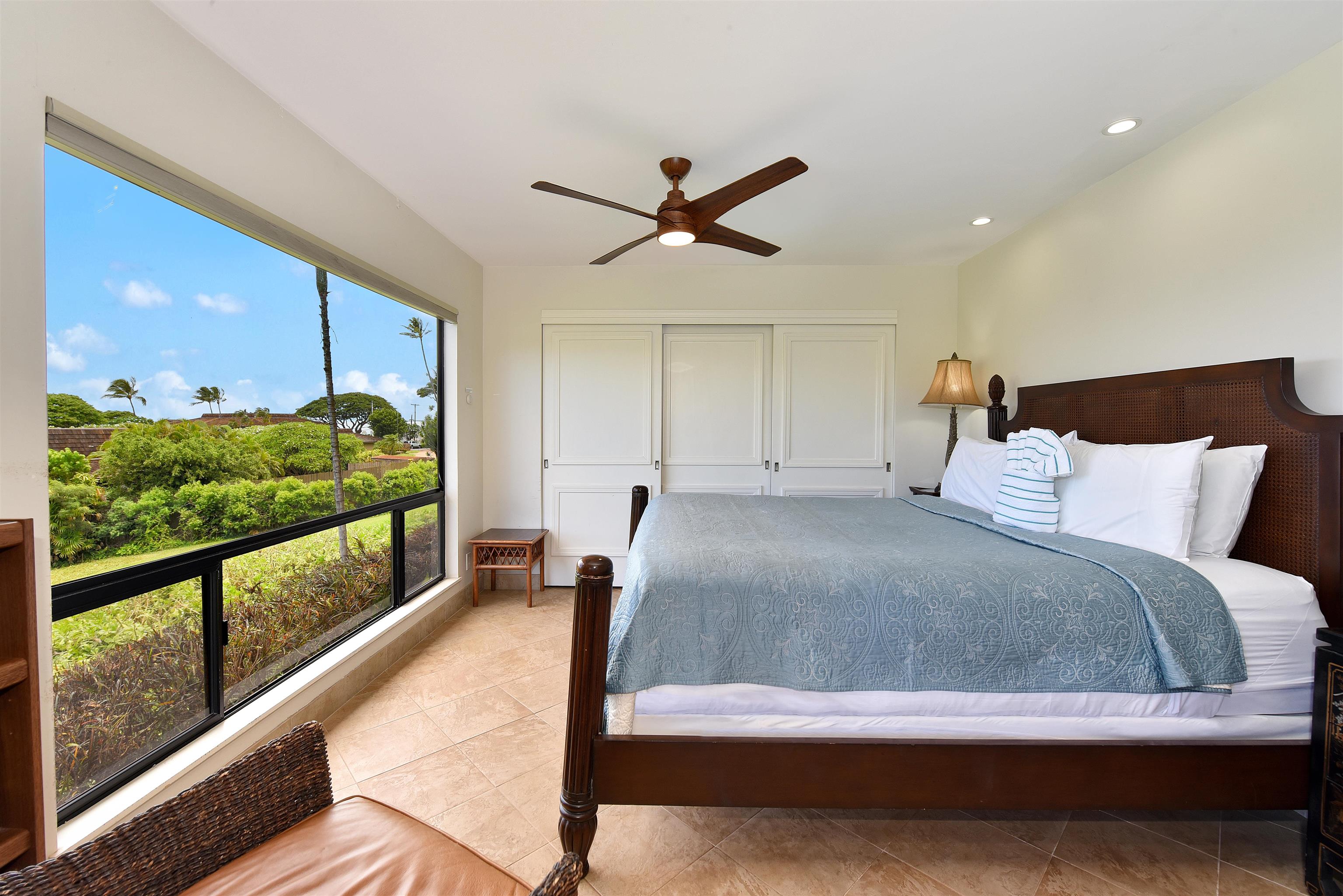 150 Puukolii Road, Unit 52 Lahaina, HI 96761 - Photo 20 of 50 a bed room with a bed and a balcony