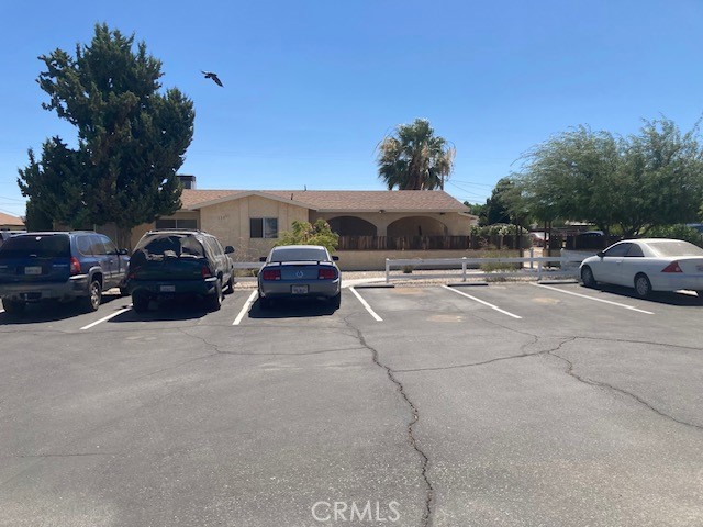 13237 Mohawk Road Apple Valley, CA 92308 - Photo 16 of 21 a car parked in front of a house