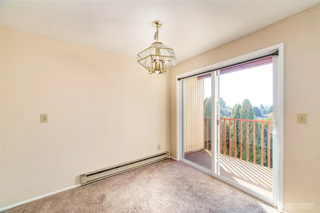 a view of a hallway with a window